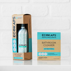 ECOKAPS bathroom cleaner sheet & bottle kit and refill envelope on a white tiled background
