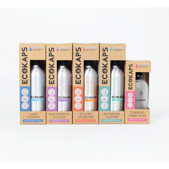 Set of Ecokaps packaging with various cleaning products on a white background