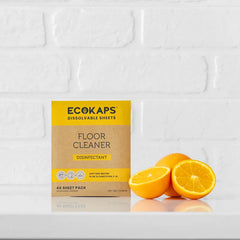 ECOKAPS floor cleaner sheets envelope with oranges on a white tiled background