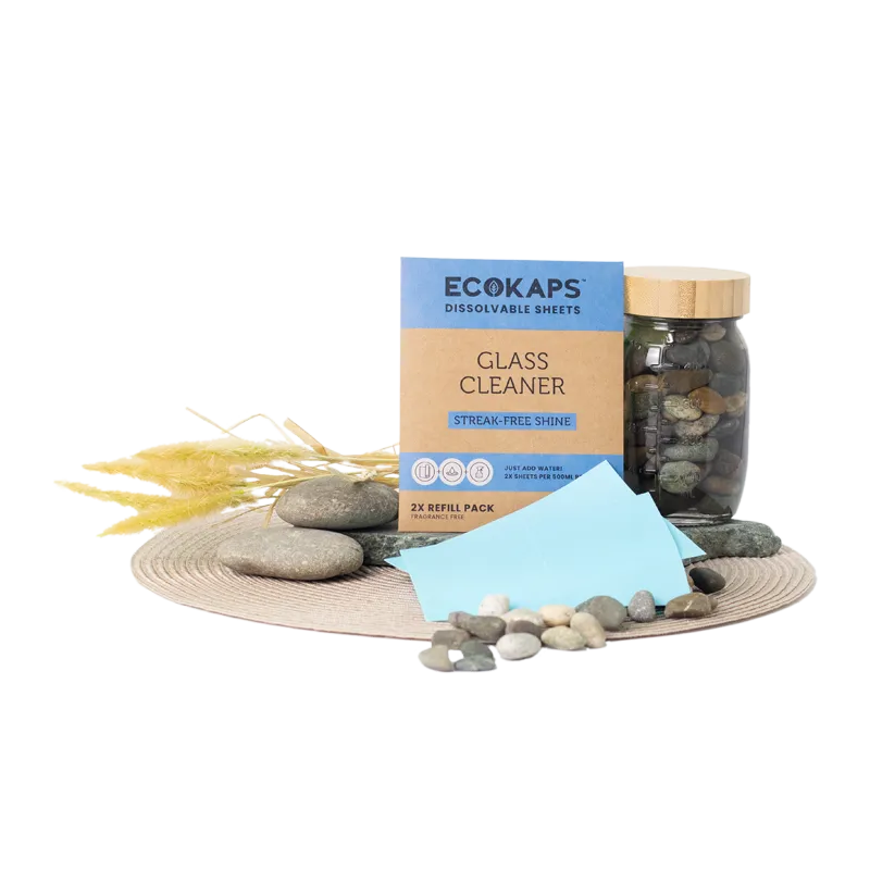 Glass cleaner sheets envelope with stones on a white background 