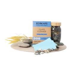 Glass cleaner sheets envelope with stones on a white background 