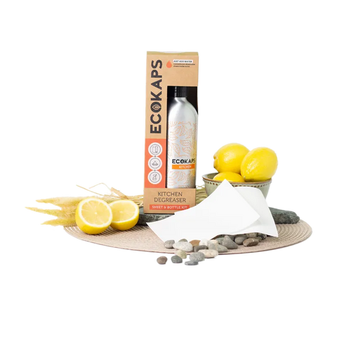 ECOKAPS kitchen degreaser sheet & bottle kit with lemons and stones on a white background